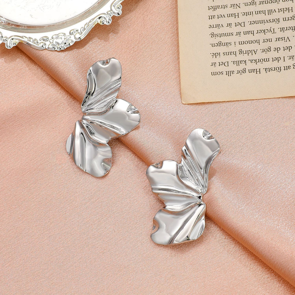 Retro-style exaggerated gold flower stud earrings, simple and elegant matte irregular petal earrings, alloy earrings for women.
