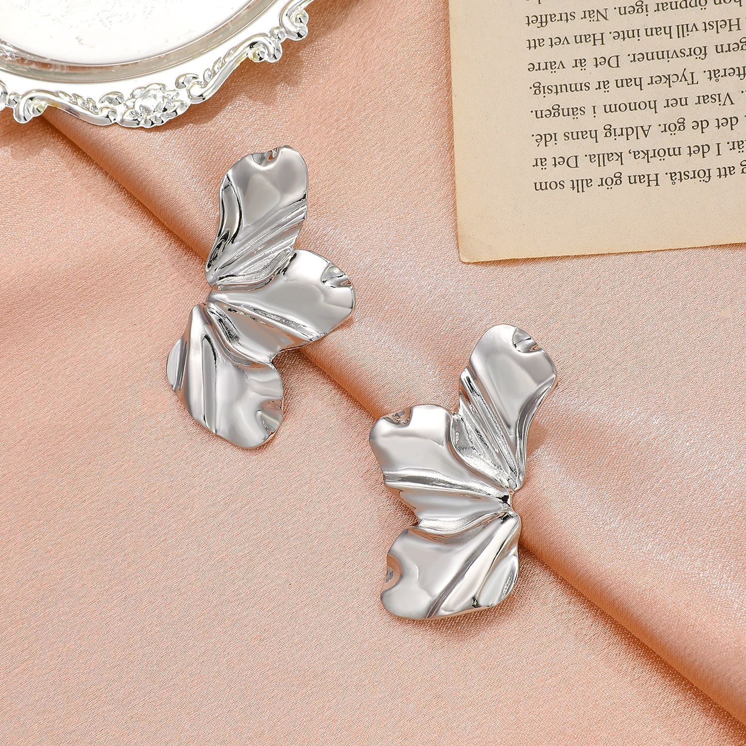 Retro-style exaggerated gold flower stud earrings, simple and elegant matte irregular petal earrings, alloy earrings for women.
