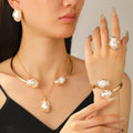Baroque-style pearl jewelry set for women, featuring a sophisticated design: necklace, earrings, ring, bracelet, and choker.